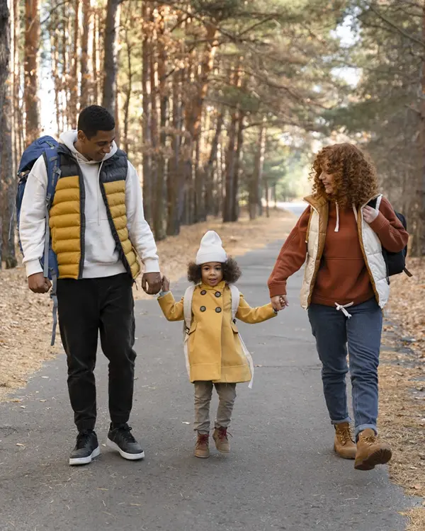 Ankle & Foot Centers of America Family Walking on the road